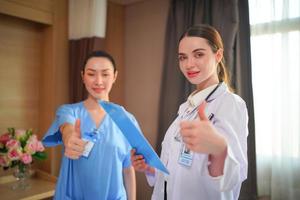 Nurse and doctor team ready for work day photo