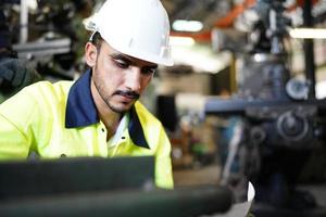 Professional men engineer worker skills quality, maintenance, training industry factory worker , warehouse Workshop for factory operators, mechanical engineering team production. photo
