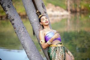 Asia woman wearing traditional Thai dress,The costume of the national dress of ancient Thailand. photo