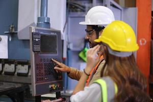 Industry worker Foreman or worker work at factory site check up machine or products in site. Engineer or Technician checking Material or Machine on Plant. Industrial and Factory.