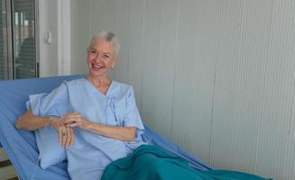 women doctor and elderly patient photo