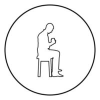 Man holding mug and looking at the contents inside while sitting on stool Concept of calm and home comfort icon outline black color vector in circle round illustration flat style image