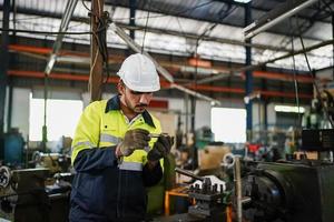 Professional men engineer worker skills quality, maintenance, training industry factory worker , warehouse Workshop for factory operators, mechanical engineering team production. photo