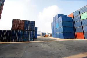 Container Cargo Port Ship Yard Storage Handling of Logistic Transportation Industry. Row of Stacking Containers of Freight Import Export Distribution Warehouse. Shipping Logistics Transport Industrial photo