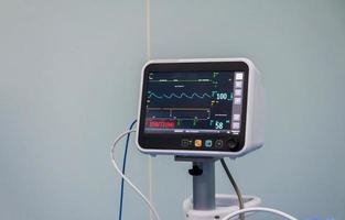 Heart rate monitor at patient room, A medical monitor displaying vital signs photo