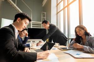 Multiethnic diverse group of business coworkers in team meeting discussion photo