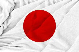Fabric wavy texture national flag of japan. photo