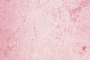 Vintage of light pink plaster texture background. Abstract painted cement wall surface. photo