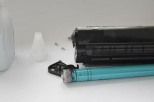 Charging the laser printer cartridge with toner powder photo