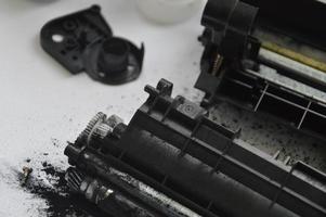 Charging the laser printer cartridge with toner powder photo