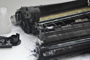 Charging the laser printer cartridge with toner powder photo