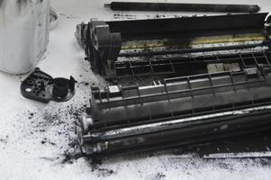 Charging the laser printer cartridge with toner powder photo