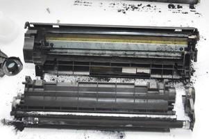 Charging the laser printer cartridge with toner powder photo