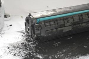 Charging the laser printer cartridge with toner powder photo