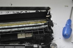 Charging the laser printer cartridge with toner powder photo