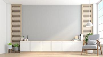 Cabinet for tv on the gray wall in living room with armchair, minimalist design.3d rendering photo