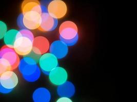Abstract background with bokeh lights colorful circular of Christmas lights photo