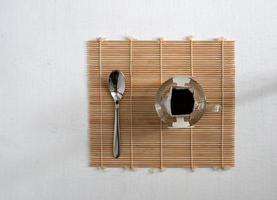 Dipping Coffee on white wood table photo