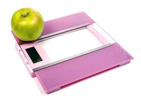 floor scales and green apple photo