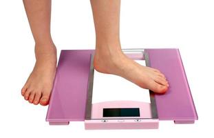 woman feet on floor scales photo