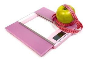 floor scales measuring ribbon and green apple photo