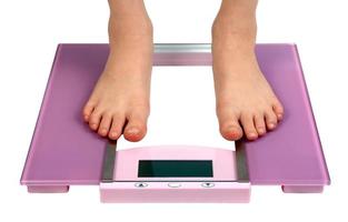 woman feet on floor scales photo