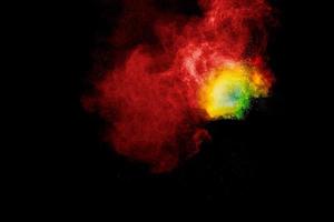 Multicolored powder explosion on black background.Colorful of pastel powder explosion. photo