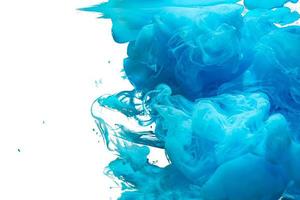 Abstract splash of blue acrylic paint. photo