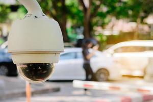 Close-up CCTV monitoring, security cameras at outdoor car parking. photo