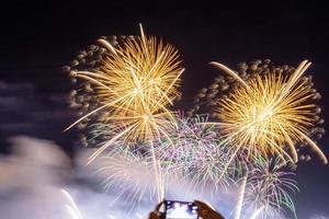 Crowd watching fireworks and celebrating. photo