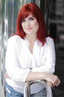 Red hair woman urbn portrait, white shirt photo