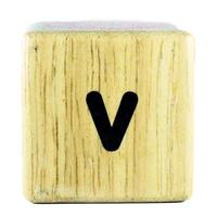 V text letters written on wooden cubes photo