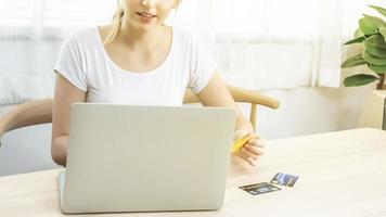 woman using a laptop computer photo