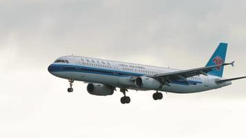 Airbus 321 approaching over ocean video