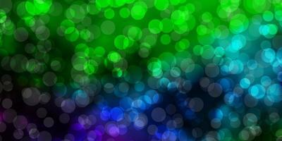 Light Multicolor vector background with circles.