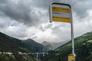 SIMPLON PASS, SWITZERLAND, 2015. Bus stop at Schallberg photo