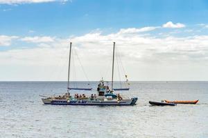 PUERTO DE MOGAN, GRAN CANARIA, CANARY ISLANDS, SPAIN, 2022. Catamaran off Puerto de Mogan