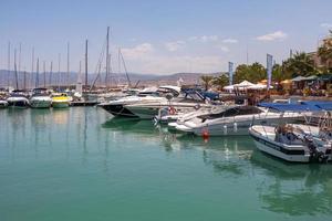 LATCHI, CYPRUS, GREECE, 2009. Assortment of boats in the marina photo