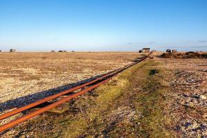 Old railway lines on Dungeness Beach photo
