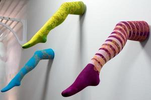 Cardiff, Wales, UK, 2014. Ladies legs in colourful tights art display in the Millennium Centre photo