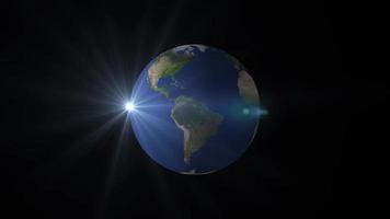 vista de la tierra desde la rotación espacial transición de noche a día. rotación de la tierra en bucle. la tierra gira sobre fondo negro, la animación de la tierra vista desde el espacio, el globo gira sobre la vista satelital