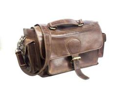 Brown vintage valise isolated on a white background photo