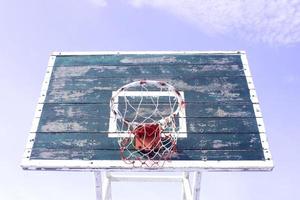 Basketball hoop on sky photo