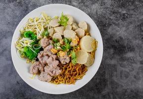 noodles with pork and meat balls photo