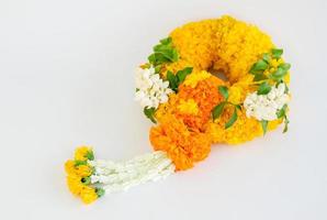 Marigold garland, flower garland white background photo