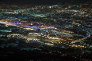 Abstract long exposure, experimental surreal photo, city and vehicle lights at night photo