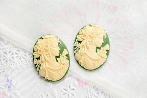 Antique cameo with ladies face, cameo brooch representing the side portrait of a woman photo