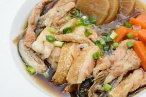 Salmon in soy source with vegetables, fish maw soup photo