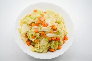 Fried Cabbage With Fish Sauce. it is a simple menu, make the fish sauce to be good smell on the surface of the pan. When sauce is heated, the water will evaporate, leaving only dried salt and fish. photo