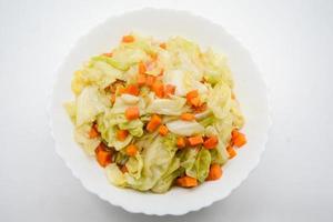 Fried Cabbage With Fish Sauce. it is a simple menu, make the fish sauce to be good smell on the surface of the pan. When sauce is heated, the water will evaporate, leaving only dried salt and fish. photo